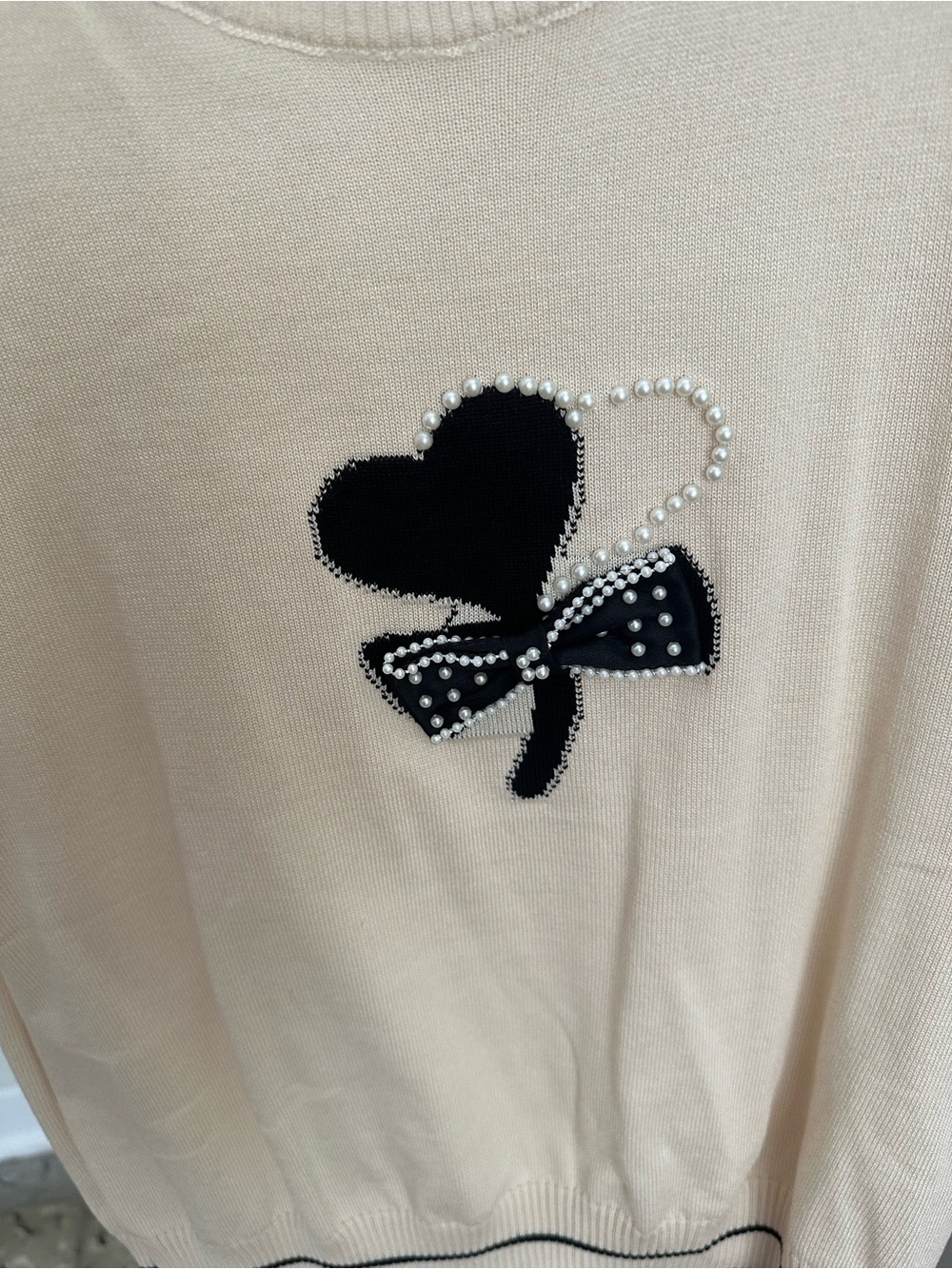 Beige Knit Sweater with Black Heart & Pearl Bow Detail
